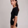 Bodysuit aus offenem Strick Bodysuit aus offenem Strick