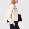 Gesteppte, kurz geschnittene Strickjacke