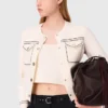 Gesteppte, kurz geschnittene Strickjacke