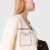 Gesteppte, kurz geschnittene Strickjacke