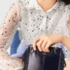 Jumpsuit aus Tweed mit Pailletten Jumpsuit aus Tweed mit Pailletten
