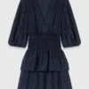 Kleid mit Rüschen und Strasssteinen