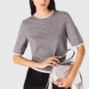 Kurzärmeliger Pullover mit Strasssteinen Kurzärmeliger Pullover mit Strasssteinen