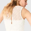 Maxikleid aus Häkelstoff mit Strasssteinen Maxikleid aus Häkelstoff mit Strasssteinen