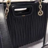 Mini-Tasche aus gestepptem Leder