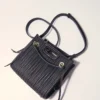 Mini-Tasche aus gestepptem Leder