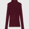 Pullover mit hohem Kragen, der wie eine zweite Haut sitzt Pullover mit hohem Kragen, der wie eine zweite Haut sitzt