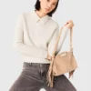 Pullover mit Perlenkragen und Rippmuster Pullover mit Perlenkragen und Rippmuster