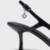 Pumps aus Lackleder mit Fersenriemen