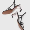 Sandalen mit Metallic-Absatz und Riemchen Sandalen mit Metallic-Absatz und Riemchen