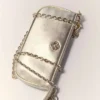 Sarah Clutch aus Metallic-Leder Sarah Clutch aus Metallic-Leder