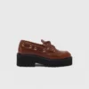 Schuhe mit klobiger Sohle Schuhe mit klobiger Sohle