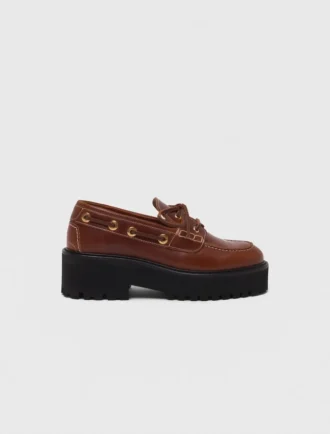 Schuhe mit klobiger Sohle