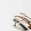 Silberne Riemchen-Pumps