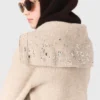 Strass-Pullover mit halbem Reißverschluss Strass-Pullover mit halbem Reißverschluss