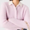 Strickjacke mit Schmuckschleife Strickjacke mit Schmuckschleife