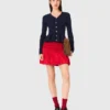 Strickjacke mit Schößchen Strickjacke mit Schößchen