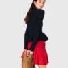 Strickjacke mit Schößchen Strickjacke mit Schößchen