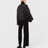 Strickjacke mit Strass-Karomuster Strickjacke mit Strass-Karomuster