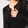 Strickjacke mit Strasssteinen Strickjacke mit Strasssteinen