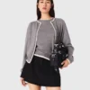 Strickjacke mit Verzierungen