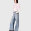 Weit geschnittene Jeans mit durchgehenden Strasssteinen Weit geschnittene Jeans mit durchgehenden Strasssteinen