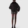 Wendbare Pufferjacke mit Pailletten