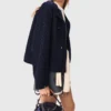 Windjacke mit Kapuze und Strasssteinen Windjacke mit Kapuze und Strasssteinen